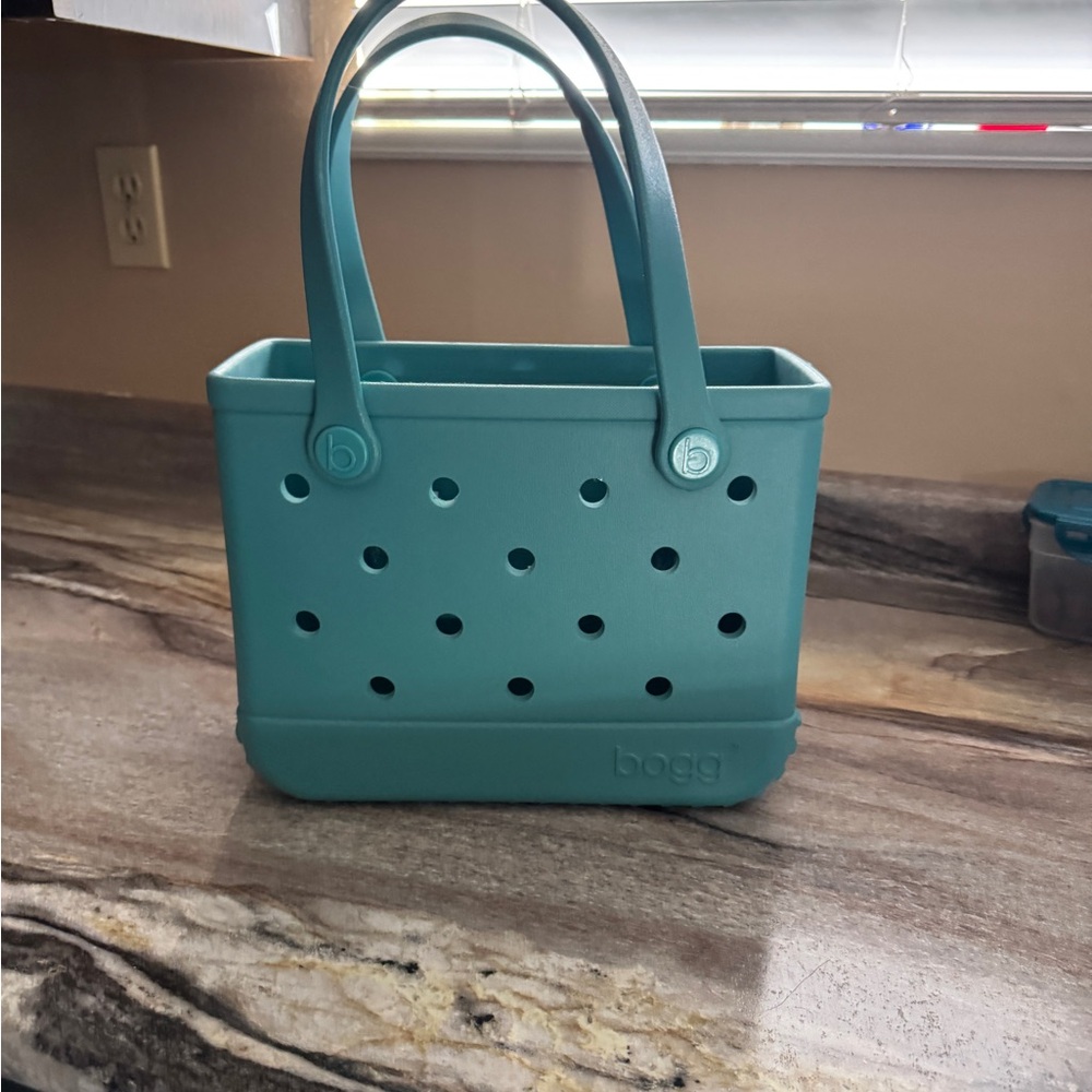 BOGG BAG Blue Tote with Perforated Design and Structured Shape.